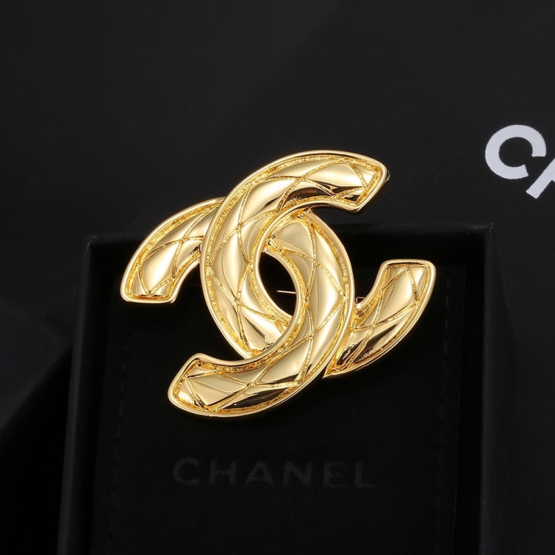 Ch*el brooches